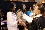 Students talking with agents
